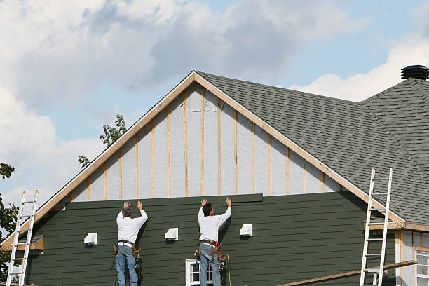 Professional Siding Installation technician working in Medford, OR
